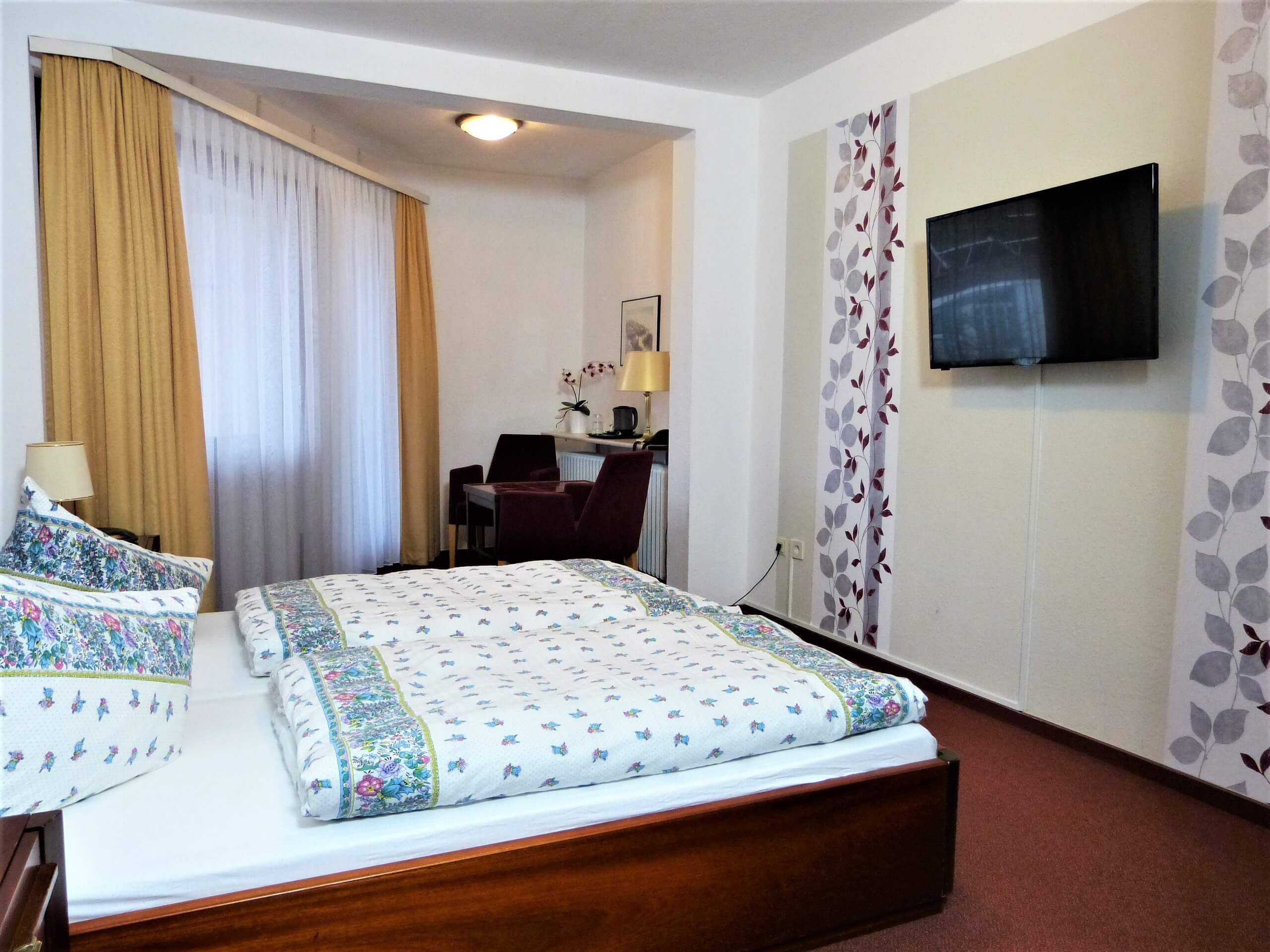 Hotel am Kurpark in Malente Doppelzimmer Betten